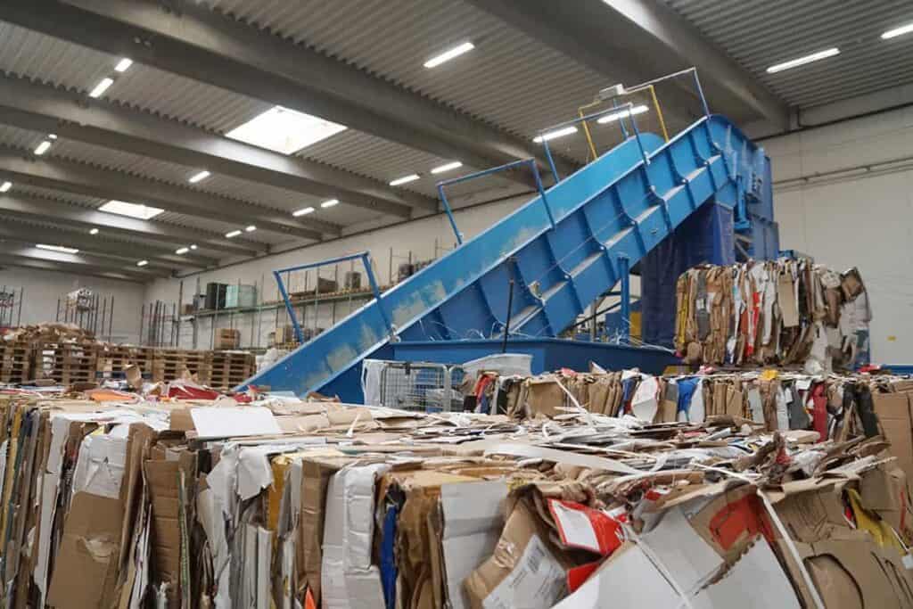 Cardboard bales and conveyor